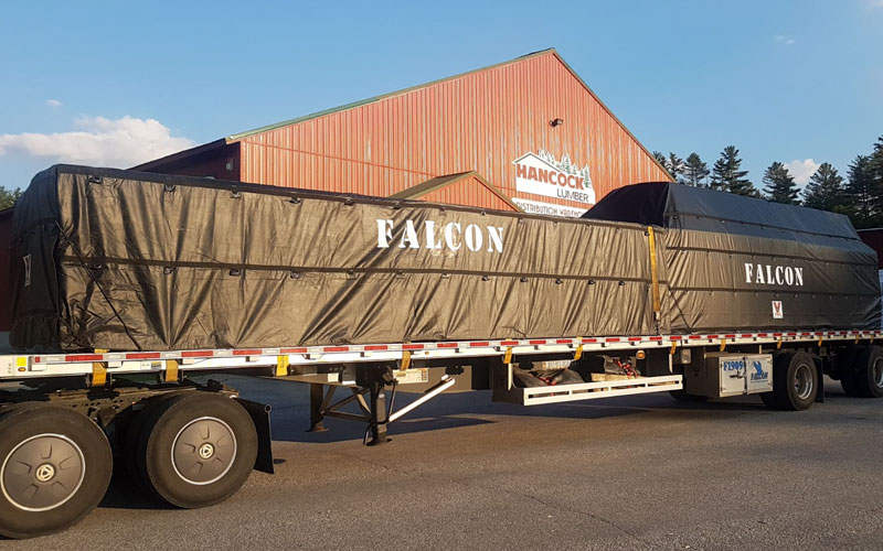 Flatbed - results in tremendous weight savings, allowing us to maximize the weight capacity on tandem axles at Falcon Xpress.