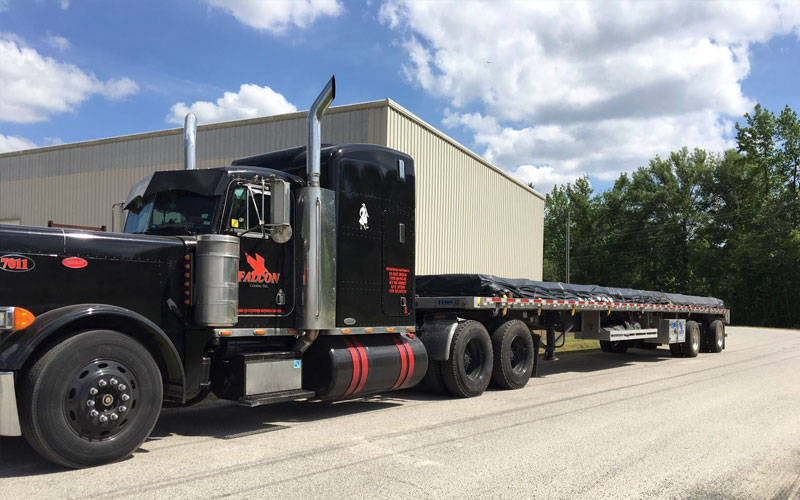 Flatbed - results in tremendous weight savings, allowing us to maximize the weight capacity on tandem axles at Falcon Xpress.